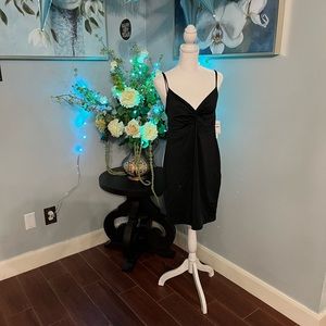 Brand new Black small dress.